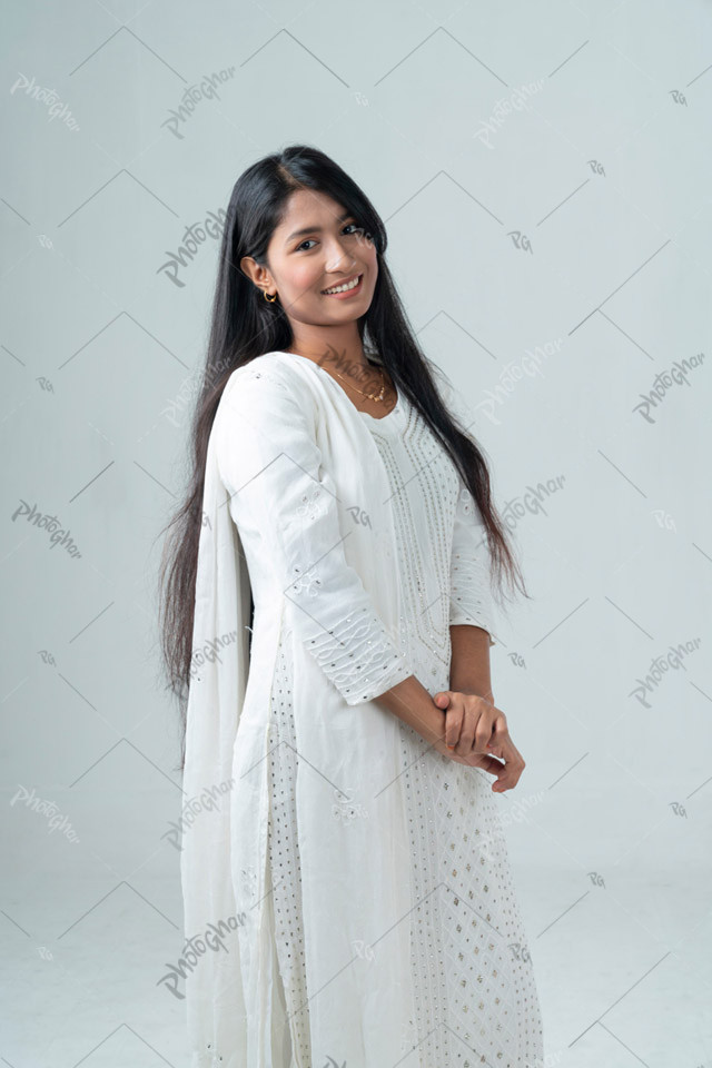 female girl standing with her beautiful long straight hair