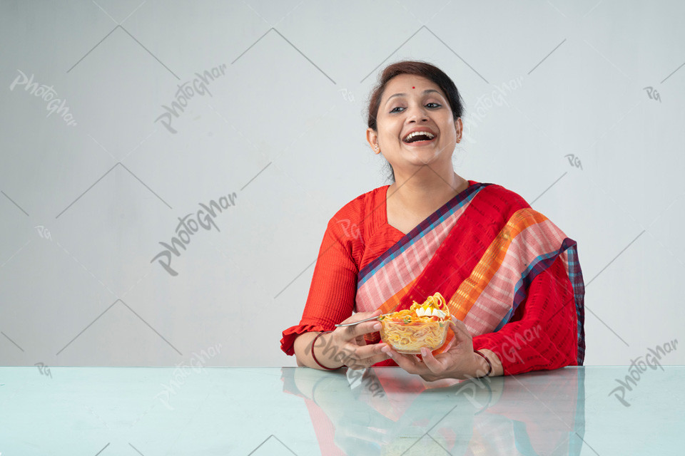 happy mother calling child for eating noodles