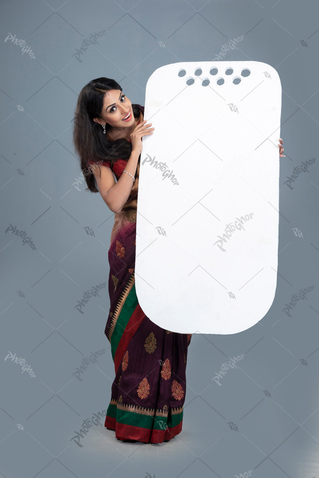 happy woman of asia showing blank mobile placard