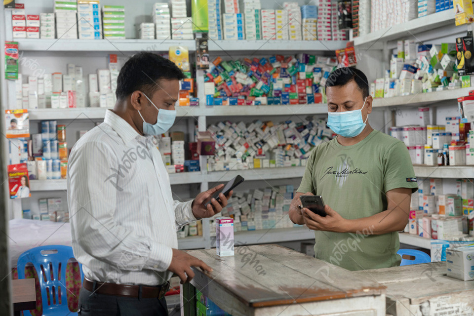 pharmacist and customer using mobile apps