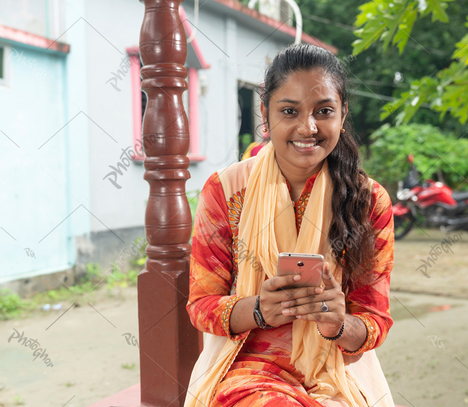 village girl of Bangladesh showing banking app