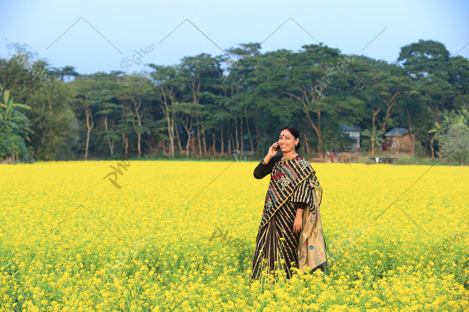 village woman talking on mobile