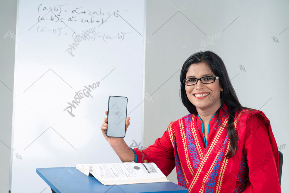 woman teacher displaying smartphone