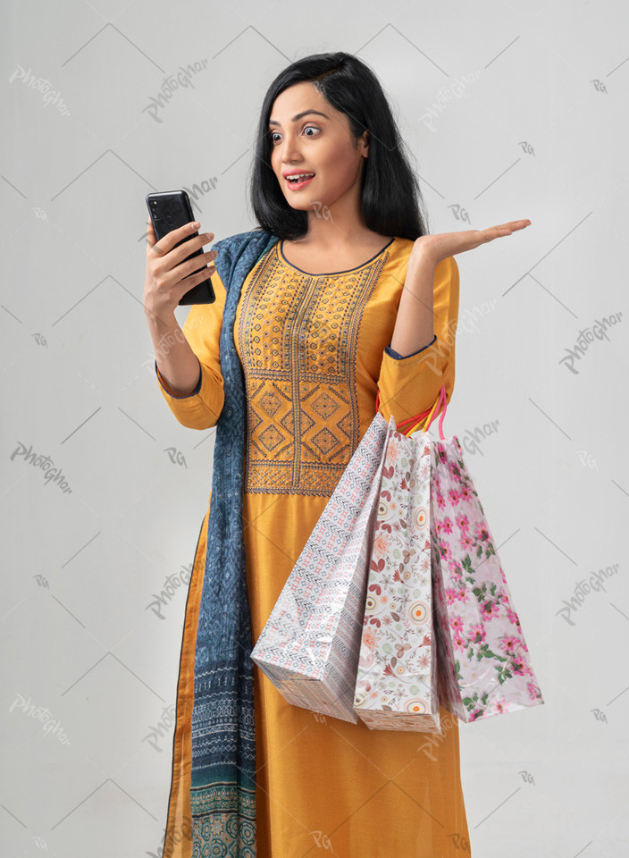 young woman looking at the phone